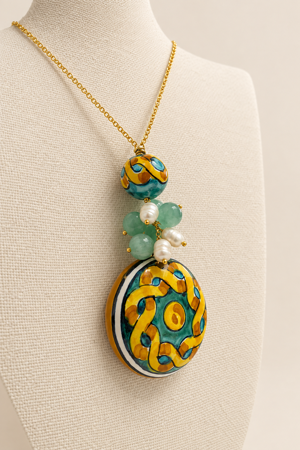 Collana con perla e ciondolo in ceramica e pietre