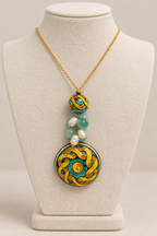 Collana con perla e ciondolo in ceramica e pietre
