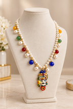Collier de perles de rivière et Tête de Maure