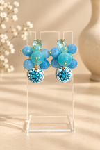Boucles d'oreilles pendantes en céramique et pierres