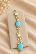 Bracciale con pasta di turchese e perle di fiume
