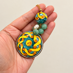 Collana con perla e ciondolo in ceramica e pietre